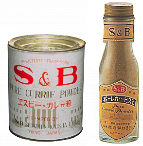 同社初の家庭用カレー粉であるヒドリ印カレー粉（右）と、戦前に販売された白缶カレー粉
