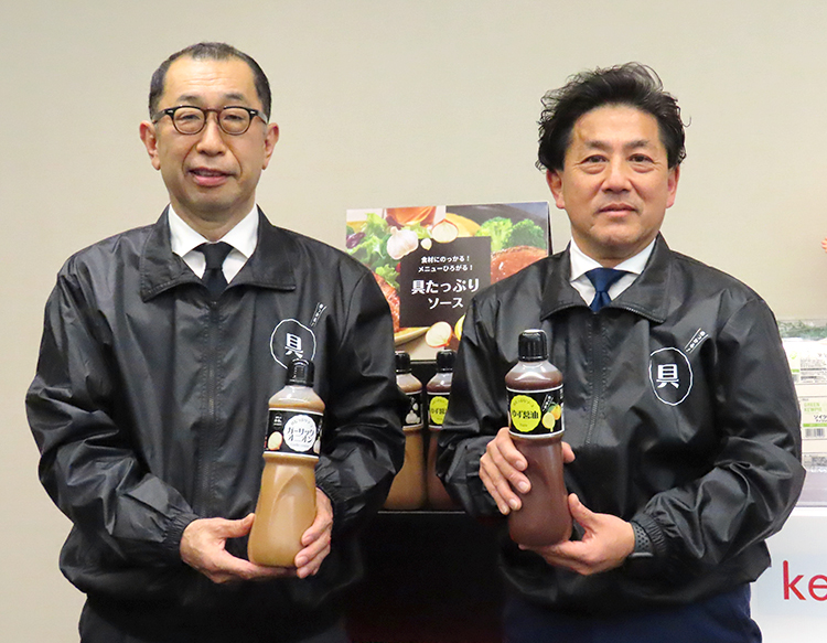 岩田清司執行役員本部長（左）と内城正秀部長