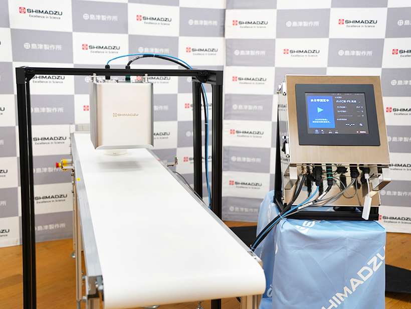 島津製作所、食品工場向けインライン水分率モニター「MMS」　乾燥重量法の課題…
