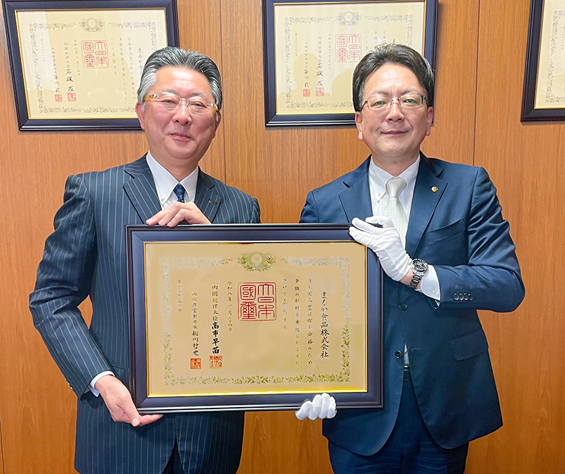 まるか食品、売上げ一部寄付で紺綬褒章